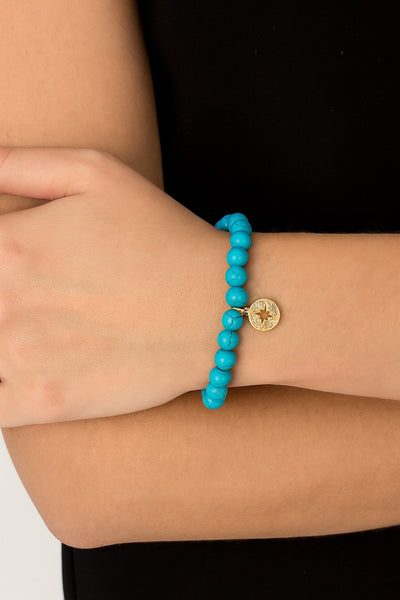 Turquoise Beaded Stretch Bracelet with Starburst Charm