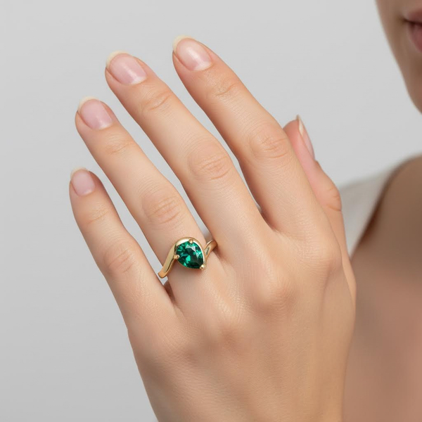 Emerald Pear CZ Solitaire on Wavy Band